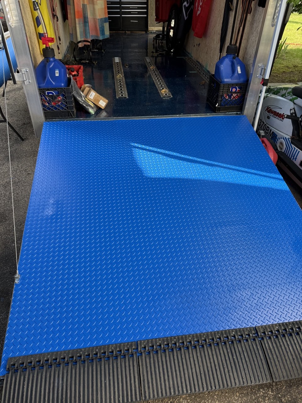 Rear ramp of an enclosed motorcycle hauler trailer