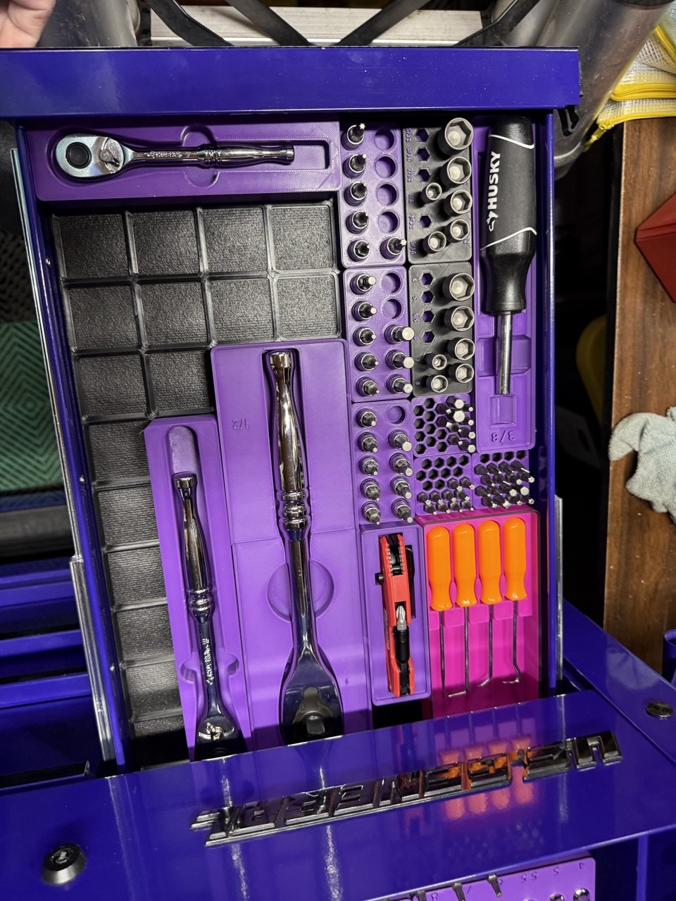 Toolbox drawer of ratchets in Gridfinity bins on a printed baseplate