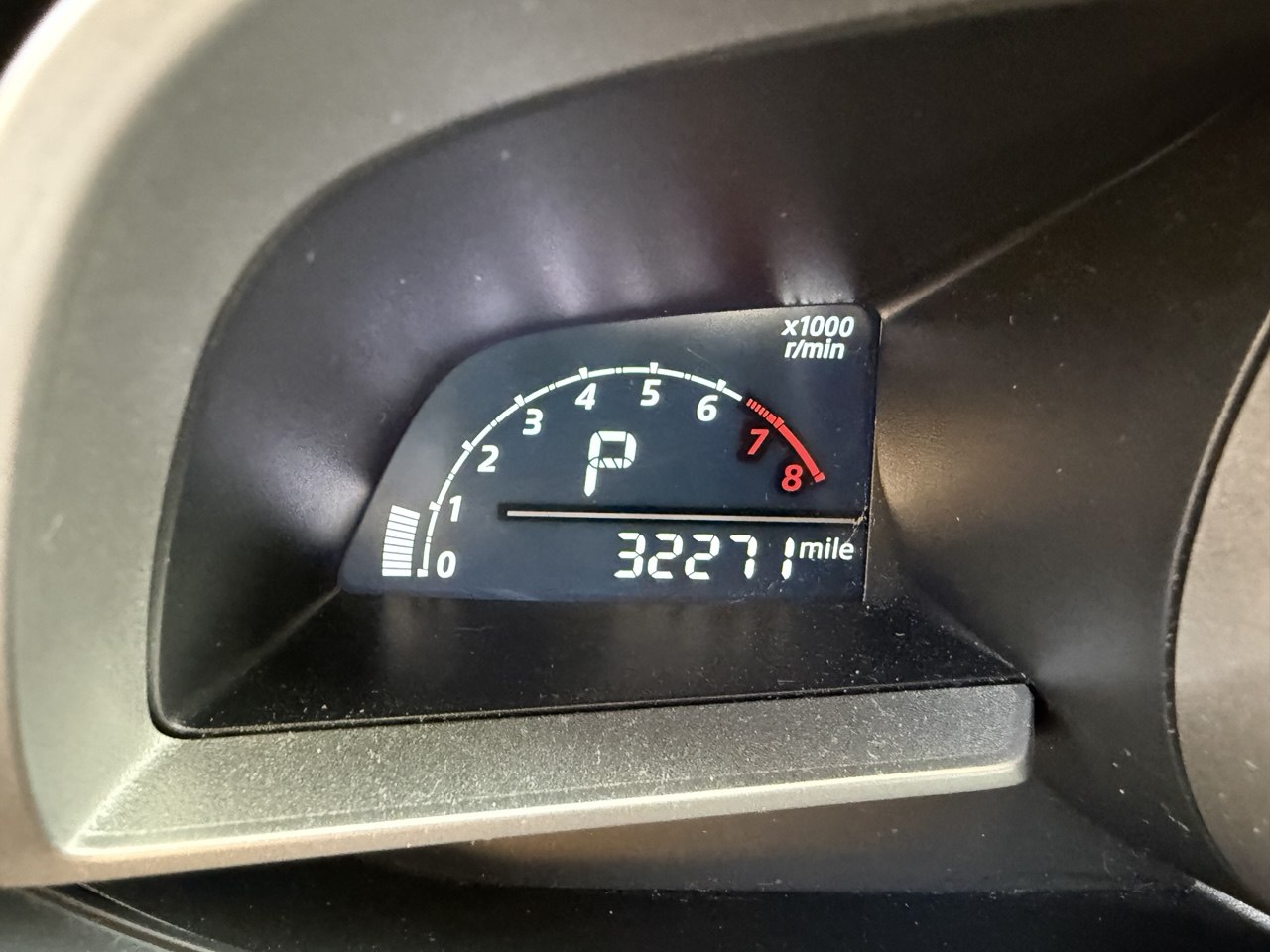 Car odometer reading 32,271 miles