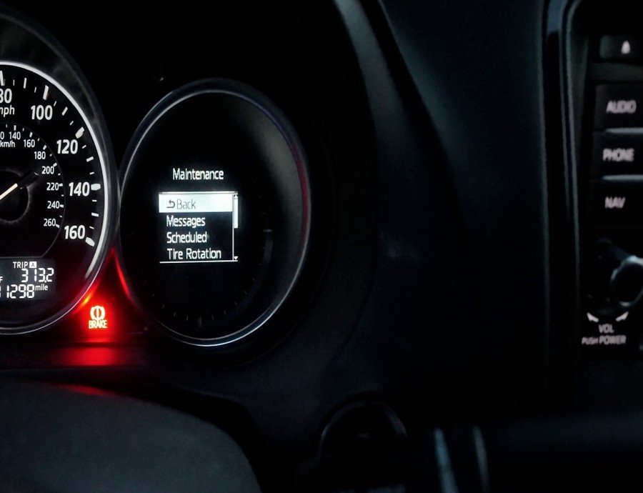 Mazda 6 gauge cluster showing the Maintenance menu with Scheduled